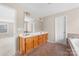 Double vanity bathroom with a large mirror at 1311 Aringill Ln, Matthews, NC 28104