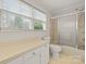 Bright bathroom with shower/tub, toilet, and vanity with countertop at 1496 Arden Dr, Lincolnton, NC 28092