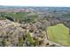 Aerial view of house and lot with surrounding trees and fields at 3100 Nc Hwy 18 Hwy, Vale, NC 28168