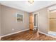 Bedroom with wood floors and access to bathroom at 3100 Nc Hwy 18 Hwy, Vale, NC 28168