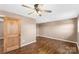 Bright bedroom featuring wood floors and ceiling fan at 3100 Nc Hwy 18 Hwy, Vale, NC 28168