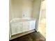 Double vanity with white cabinets and quartz countertops at 344 C I Chapman Ct, Taylorsville, NC 28681