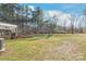 Large backyard with grassy area and wooded backdrop at 4171 Island Fox Ln, Denver, NC 28037