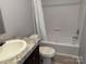 Bathroom with tub, toilet, and vanity at 419 Davis Rd, Shelby, NC 28152