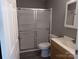 Clean bathroom with updated vanity and shower at 510 Cannon St, Rockwell, NC 28138