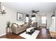 Living room features hardwood floors and neutral decor at 7316 Hollow Brook Ct, Indian Land, SC 29707