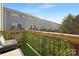 Back deck with artificial turf and leafy decor at 840 Imperial Ct, Charlotte, NC 28273