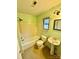 Bathroom with shower/tub combo and pedestal sink at 8717 Windsong Dr, Charlotte, NC 28273