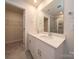 Bathroom with double vanity, quartz countertop, and a large walk-in shower at 1353 31St Ne St, Conover, NC 28613