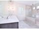 Bathroom with double vanity, large mirror, and shower at 1364 Cedardale Ln, Denver, NC 28037