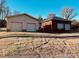 View of two-car attached garage and a detached garage at 155 Stanwyck Rd, Salisbury, NC 28147