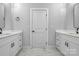 Modern bathroom with double vanity and marble flooring at 1856 County Line Rd, Kings Mountain, NC 28086