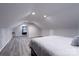 Large bedroom with gray walls and wood-look floors at 1909 Glenwood St, Kannapolis, NC 28083