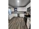 Well-equipped kitchen featuring white cabinets and granite counters at 1909 Glenwood St, Kannapolis, NC 28083