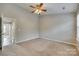 Bright bedroom with neutral walls and carpet at 306 Tinderbox Ln, Fort Mill, SC 29708