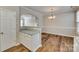 Kitchen features granite countertops and white cabinets at 306 Tinderbox Ln, Fort Mill, SC 29708