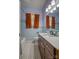 Clean bathroom with light blue tile and a modern vanity at 400 N Ashe Ave, Newton, NC 28658