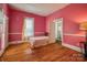 Cozy bedroom with wood floors and a view at 400 N Ashe Ave, Newton, NC 28658