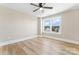 Spacious bedroom with hardwood floors and large windows at 4444 Triumph Sw Dr, Concord, NC 28027