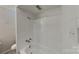 Simple bathroom with a shower/tub combo and white tile at 531 N Carolina Ave, Statesville, NC 28677