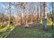 Wooded backyard space behind the property at 939 Autumnwood Ln, Charlotte, NC 28213