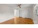 Well-lit bedroom featuring hardwood floors and double closets at 109 James Dr, Belmont, NC 28012