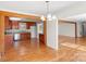 Spacious dining area with hardwood floors and kitchen views at 109 James Dr, Belmont, NC 28012