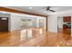 Bright living room with hardwood floors and exposed beam at 109 James Dr, Belmont, NC 28012