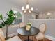 Small dining area with round table and four chairs, near kitchen at 1156 Brighton Pl, Charlotte, NC 28205