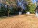 Large backyard with sheds and space for outdoor activities at 138 Pounds Sw Ave, Concord, NC 28025