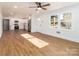 Open concept kitchen with stainless steel appliances and hardwood floors at 138 Pounds Sw Ave, Concord, NC 28025