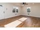 Bright living room featuring hardwood floors and lots of natural light at 138 Pounds Sw Ave, Concord, NC 28025