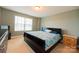 Bedroom with a sleigh bed and window with blinds at 1735 Herndon Farm Rd, Rock Hill, SC 29732
