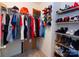 Well-organized closet with hanging clothes and shoe shelves at 1735 Herndon Farm Rd, Rock Hill, SC 29732
