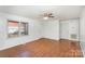 Spacious living room with hardwood floors and neutral walls at 401 W Ballard St, Cherryville, NC 28021