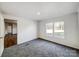 Simple bedroom with grey carpet and view to hallway at 6339 Helens Way, Denver, NC 28037