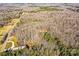 Aerial view showcasing extensive wooded acreage at 8327 Walkup Rd, Waxhaw, NC 28173