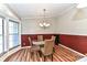 Charming dining area featuring a glass table and wicker chairs at 8327 Walkup Rd, Waxhaw, NC 28173