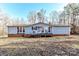 Ranch style home with deck and wooded backdrop at 8327 Walkup Rd, Waxhaw, NC 28173