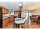 Kitchen with island and wood cabinets at 8327 Walkup Rd, Waxhaw, NC 28173
