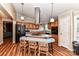 Spacious kitchen with wood cabinets, island, and modern appliances at 8327 Walkup Rd, Waxhaw, NC 28173