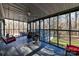 Screened porch overlooks backyard and wooded area at 8327 Walkup Rd, Waxhaw, NC 28173