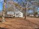 White single story home with travel trailer in the yard at 113 Barron Park, York, SC 29745