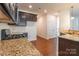 Modern kitchen with granite countertops and stainless steel appliances at 1270 Hideaway Gulch Dr, Fort Mill, SC 29715