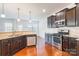 Open kitchen with granite counters, stainless steel appliances, and island at 1270 Hideaway Gulch Dr, Fort Mill, SC 29715