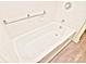 Simple bathroom with a bathtub and grab bars at 16523 Clear Creek Dr, Midland, NC 28107