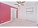 Bright bedroom with carpeting, mirrored closet doors, and ceiling fan at 16523 Clear Creek Dr, Midland, NC 28107