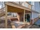 Covered patio area under deck with brick walls at 1934 Hickory Hills Dr, Denver, NC 28037