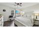 Bedroom with white bed frame and ceiling fan at 1976 Bost St, Lincolnton, NC 28092