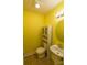Bright bathroom with yellow walls and a pedestal sink at 2138 Durand Rd, Fort Mill, SC 29715